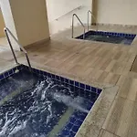 Casa Da Madeira Caldas Novas - Achei Ferias - Com Roupa De Cama